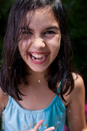 Little girl playing with water