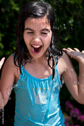 Little girl playing with water