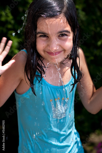 Little girl playing with water