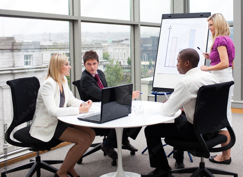 Business people working together in an office Business people working together in an office