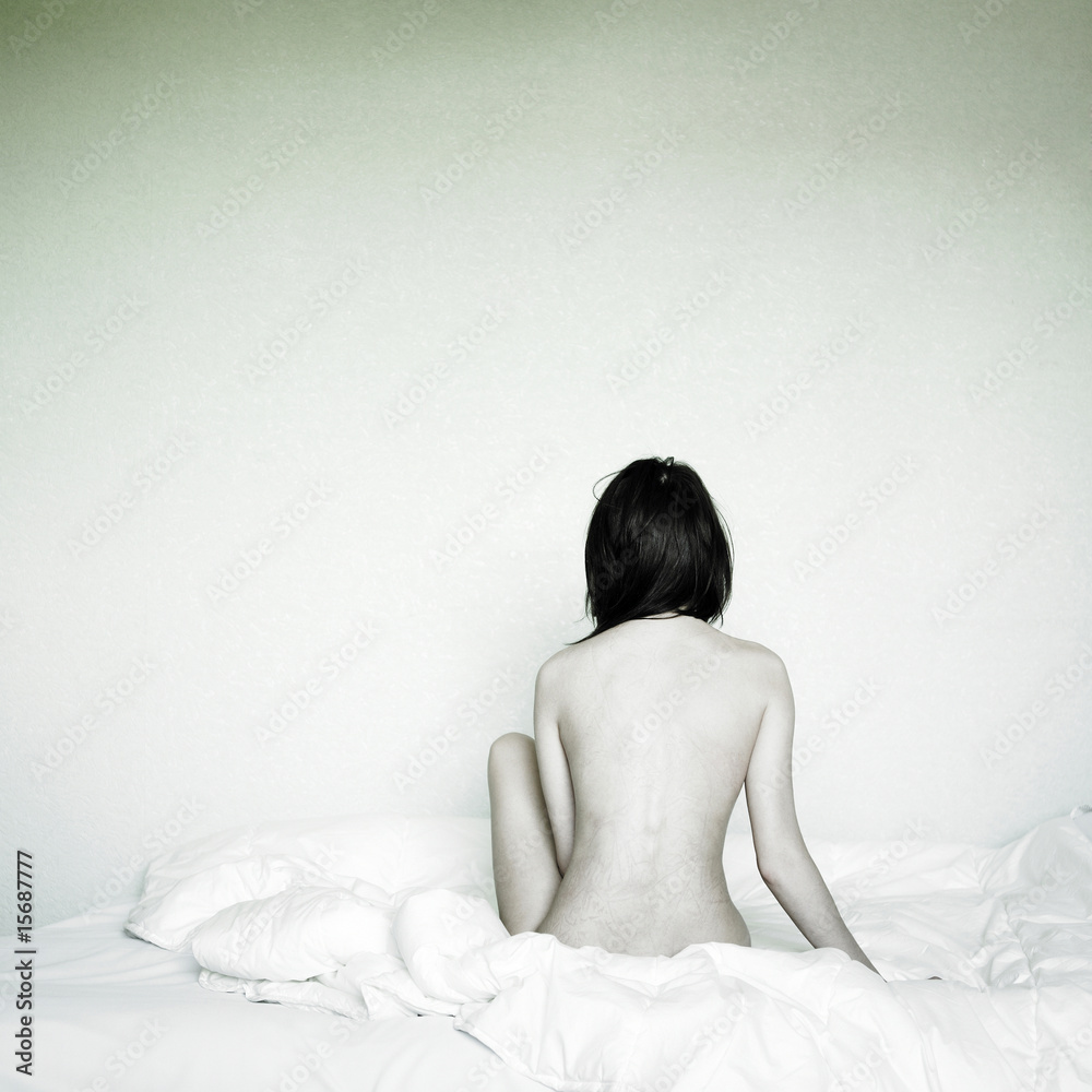 Fototapeta premium Young beautiful woman in bed