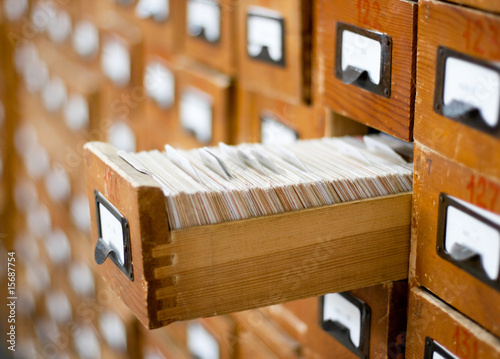 Old wooden card catalogue with one opened drawer