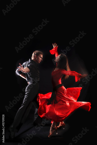 dancer in action against black background