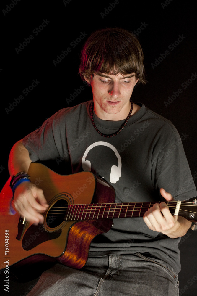Obraz premium Teen Playing Guitar