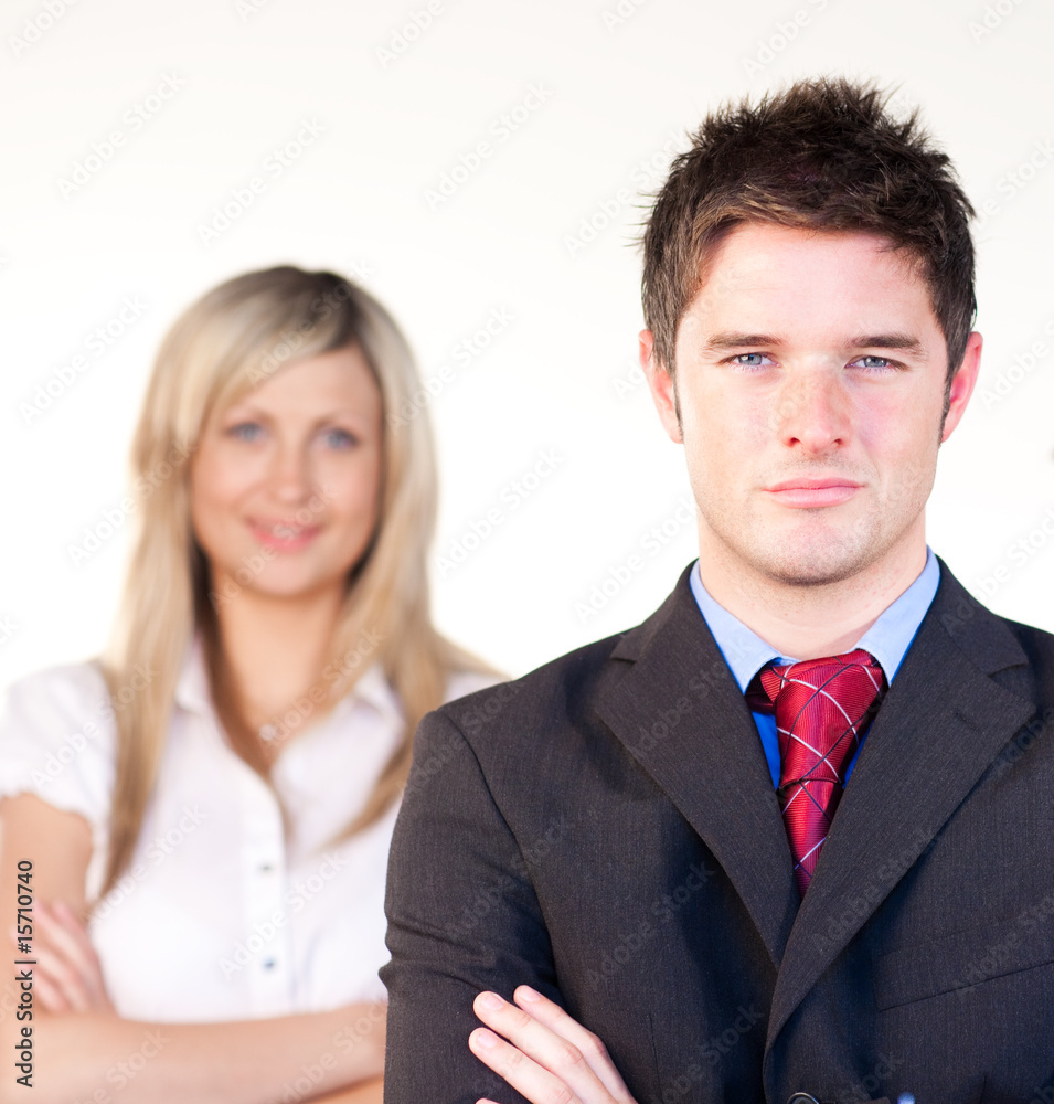 Confident businessman in front of a businesswoman Confident businessman in front of a businesswoman