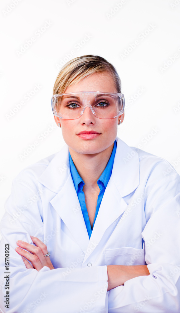 Serious female scientist looking at the camera Serious female scientist looking at the camera