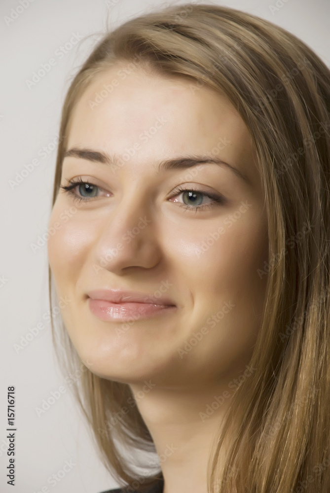 Naklejka premium young girl blonde with long hairs portrait