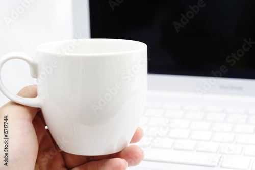 coffee break (holding a tea cup)