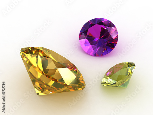Two yellow sapphire and an amethyst stones