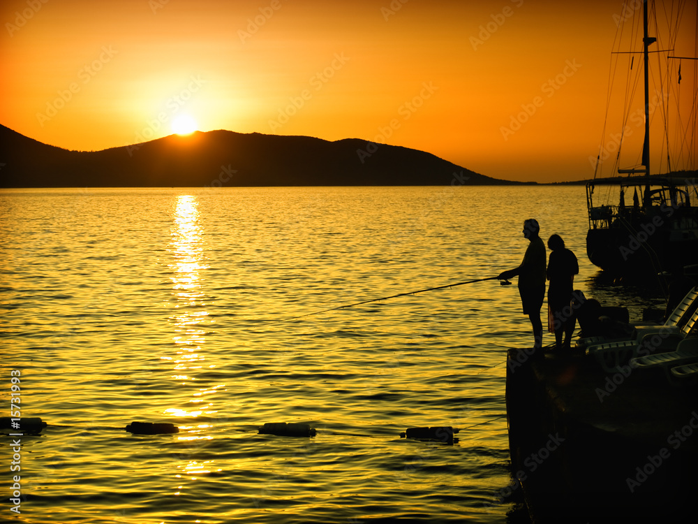 fishing in the sunset