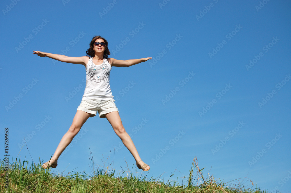 girl jumping against the beautiful sky girl jumping against the beautiful sky