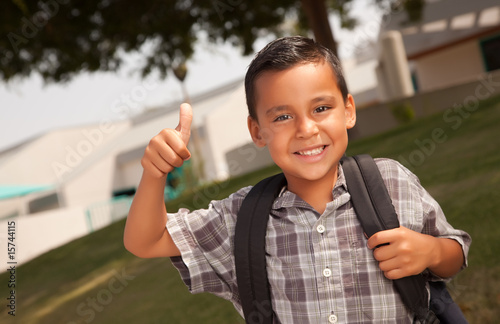 Happy Young Hispanic Boy Re...