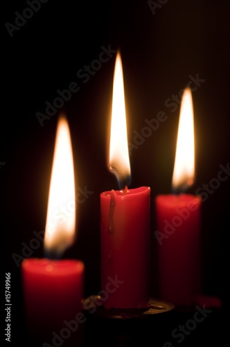 Three burning candles