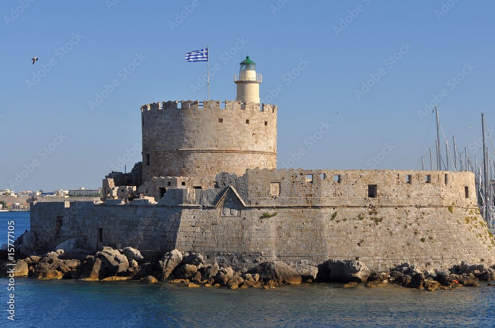lighthouse and fortress on Rhodes island.port Mandraki