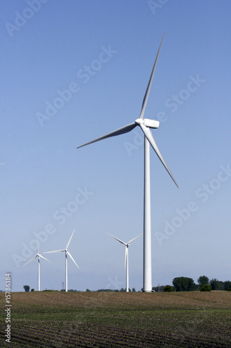 Wind turbines in field