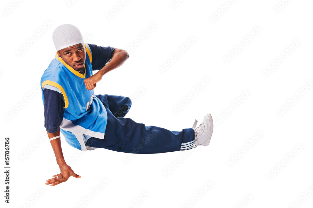 Hip-hop young man making cool move on white background