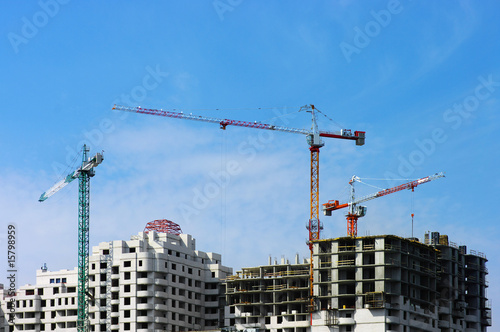 Building tower crane on the sky background