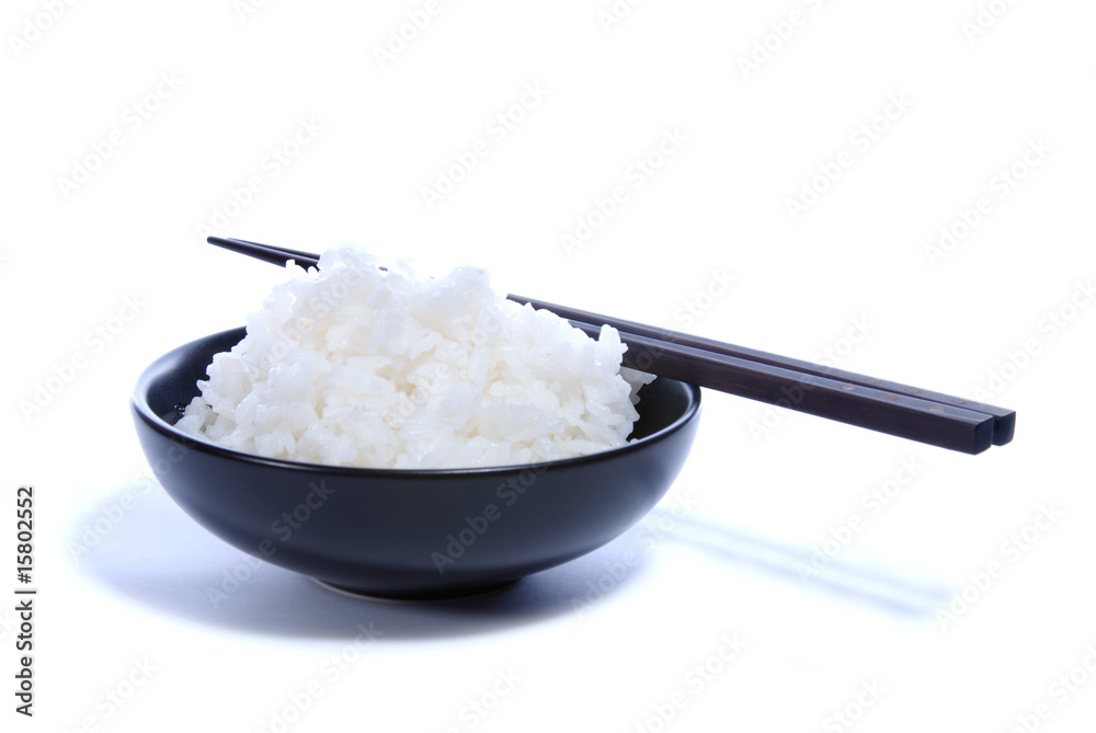 Black bowl with white rice and chop sticks Black bowl with white rice and chop sticks