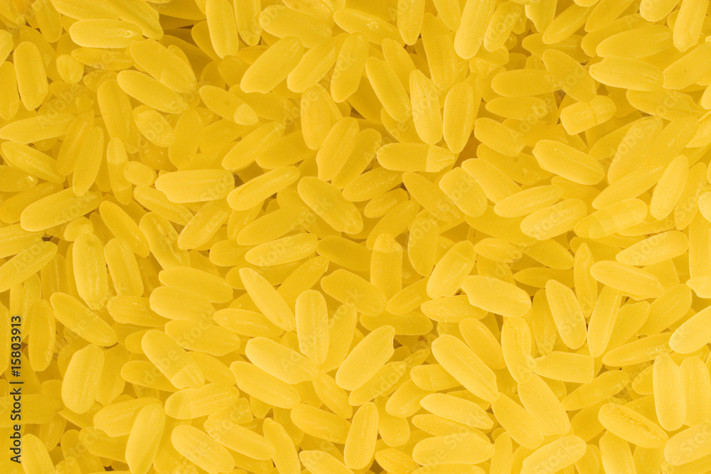 Closeup of yellow rice (as a food background) Closeup of yellow rice (as a food background)