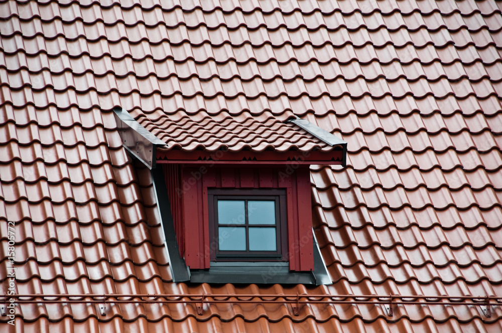 Window on mansard with tilled roof Window on mansard with tilled roof