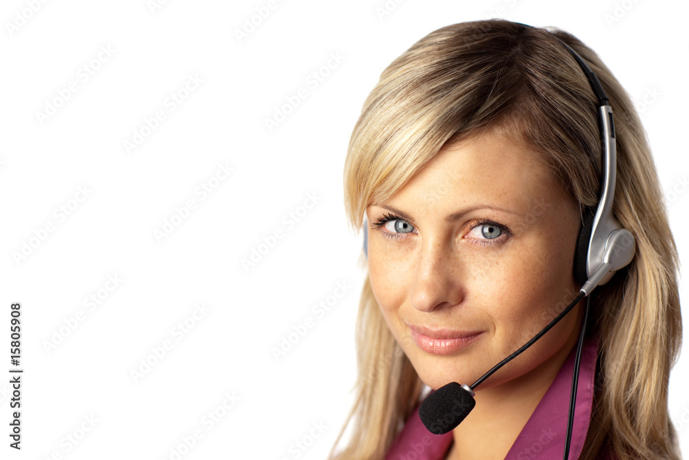 Young business woman talking on a headset Young business woman talking on a headset