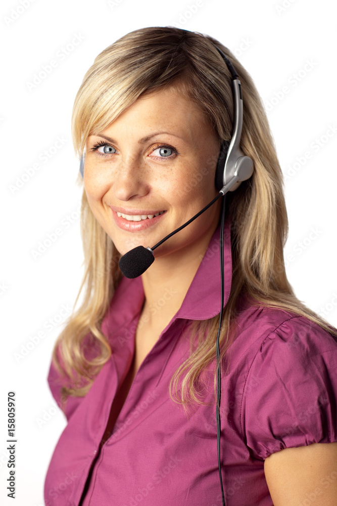 Young business woman talking on a headset Young business woman talking on a headset