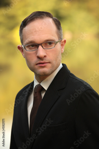portrait of businessman wearing glasses