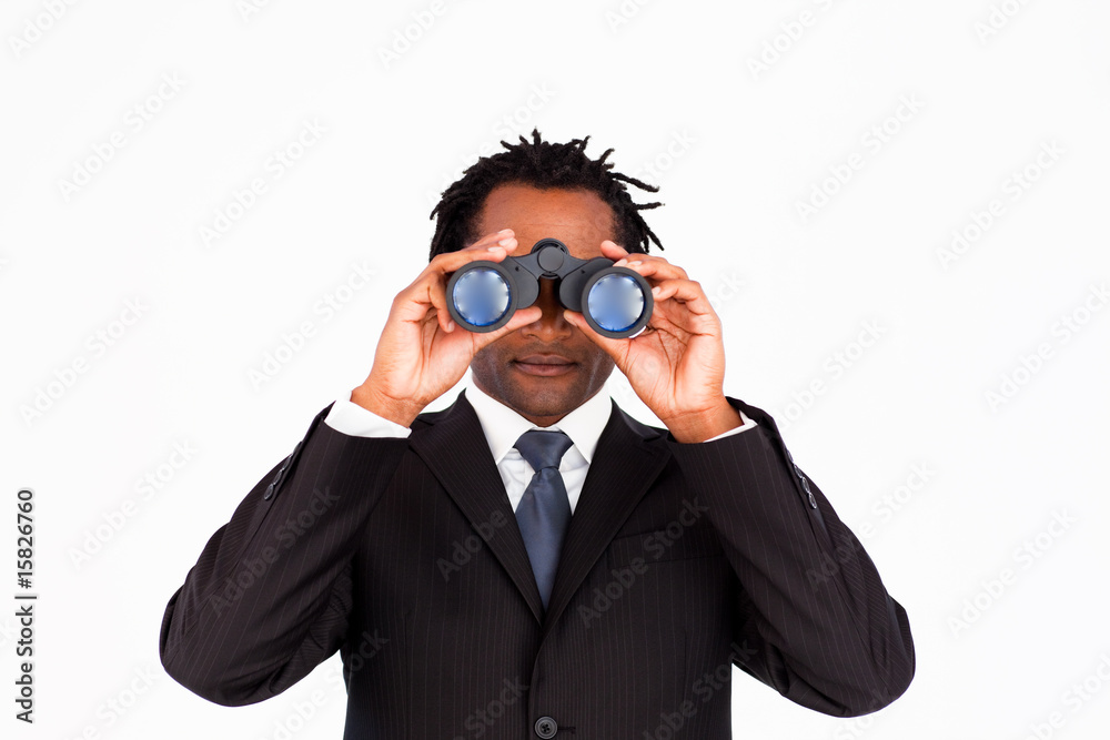 Businessman looking through binoculars Businessman looking through binoculars