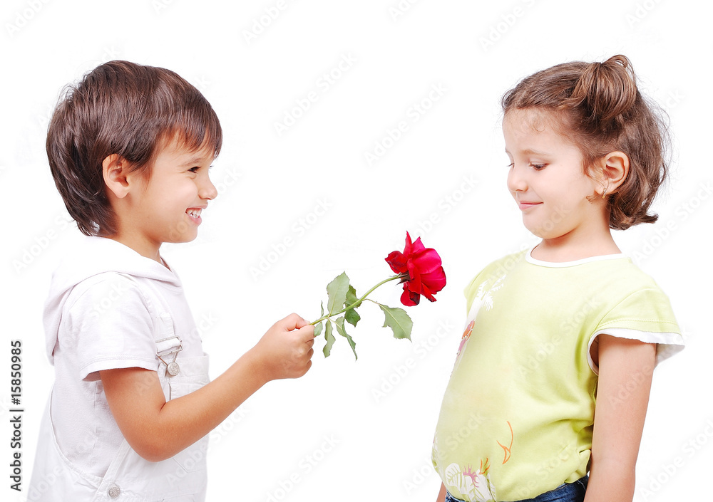 Very cute scene of two little children with rose Very cute scene of two little children with rose