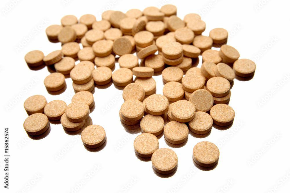 Vitamin C tablets over white background Vitamin C tablets over white background