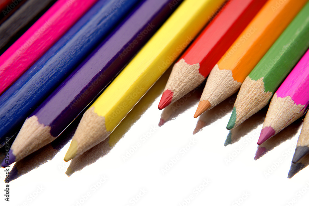 Colored pencils over white background Colored pencils over white background