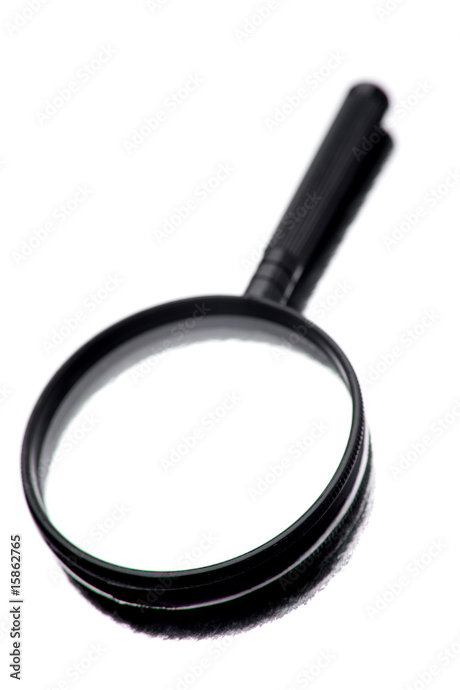 Magnifying glass isolated over white background Magnifying glass isolated over white background