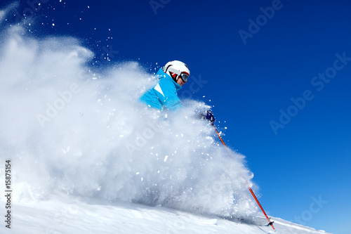 skiing woman in powder snow