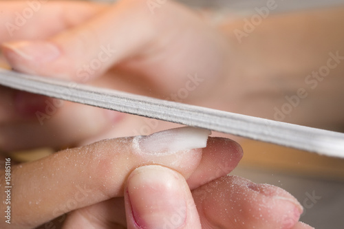 Картината върху платно Polishing fingernails