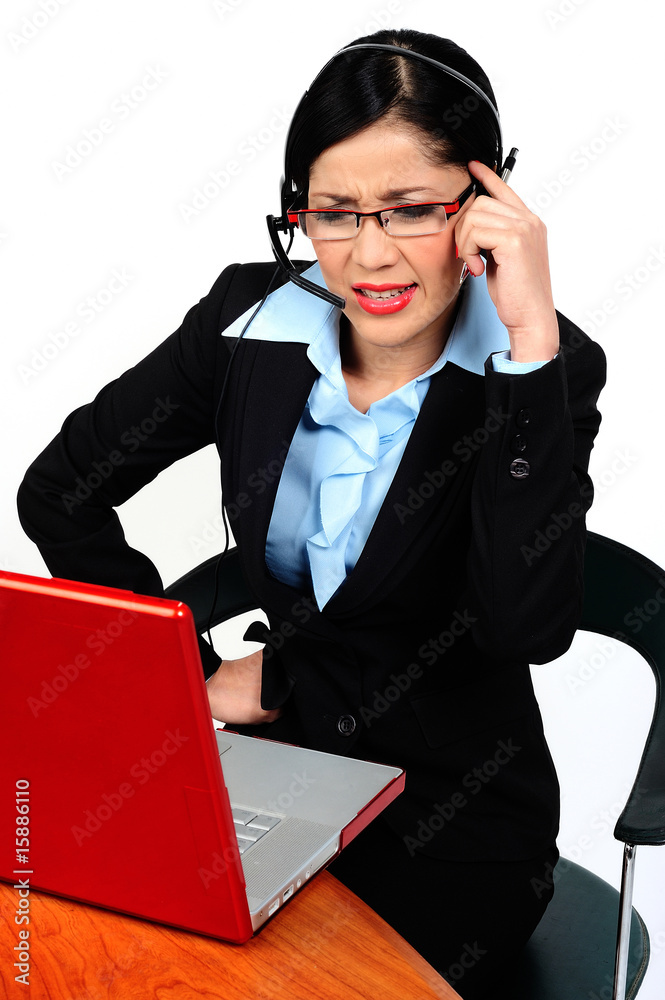 arguing with someone at the phone and looking at the computer arguing with someone at the phone and looking at the computer