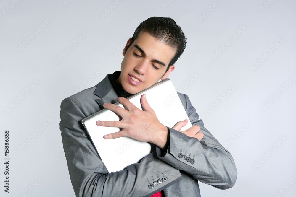 Businessman young embracing computer, hug laptop Businessman young embracing computer, hug laptop