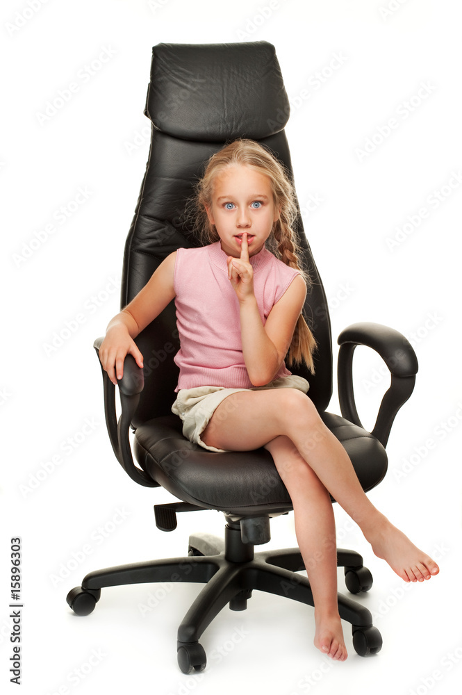 Fototapeta premium Young girl sitting on a chai