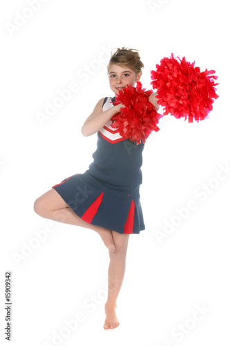 cute cheerleader balancing on one leg