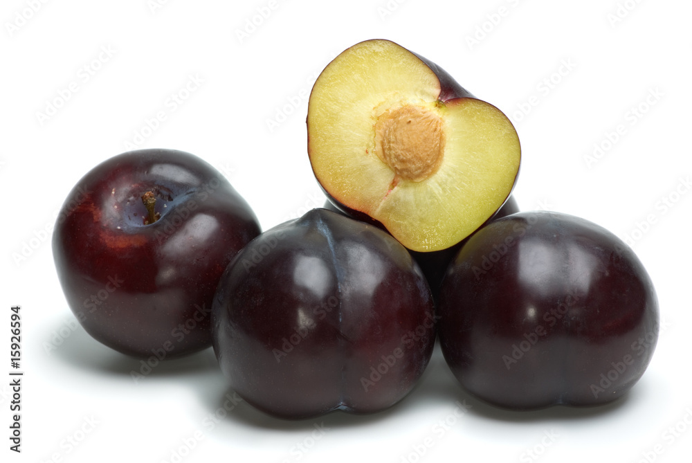 Some whole plums and one half