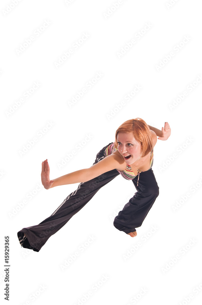 Red haired girl performing fitness exercises Red haired girl performing fitness exercises