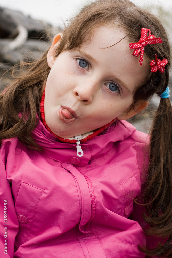Girl showing her tongue Girl showing her tongue