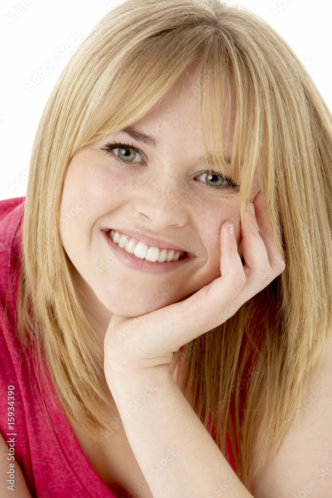 Studio Portrait Of Smiling Teenage Girl Studio Portrait Of Smiling Teenage Girl