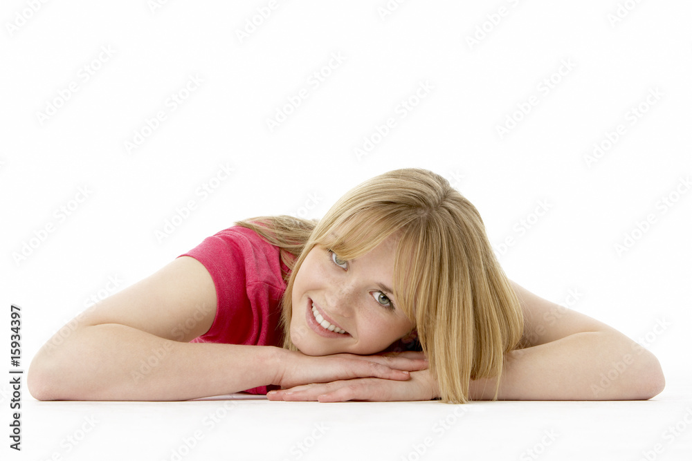 Fototapeta premium Studio Portrait Of Smiling Teenage Girl