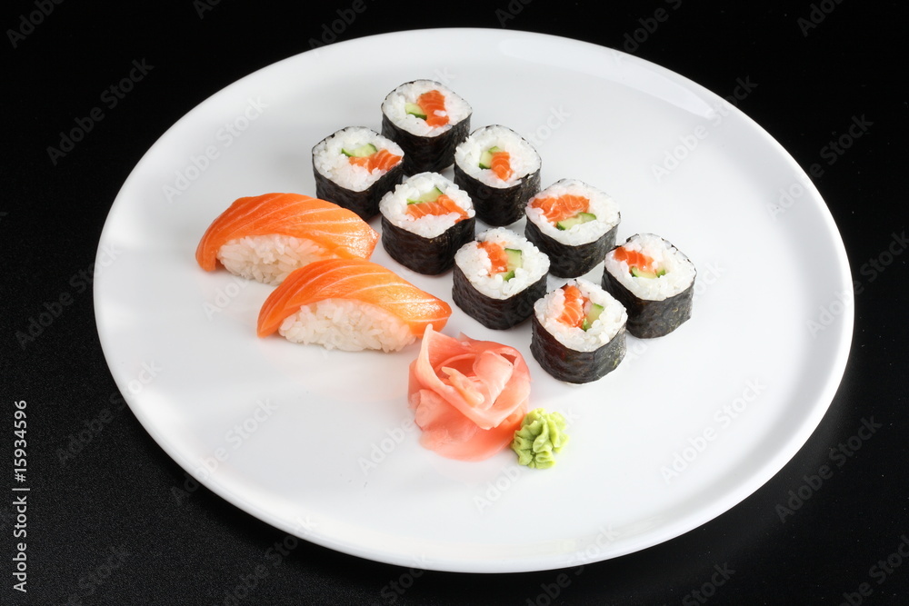 Set of sushi and rolls with a salmon Set of sushi and rolls with a salmon