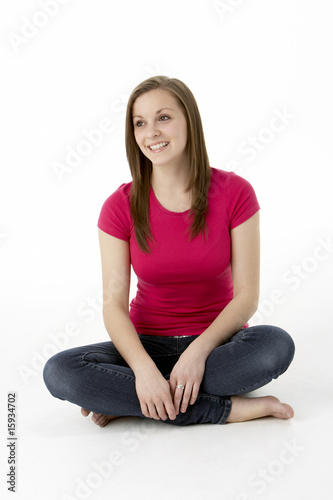 Teenage Girl Sitting In Studio