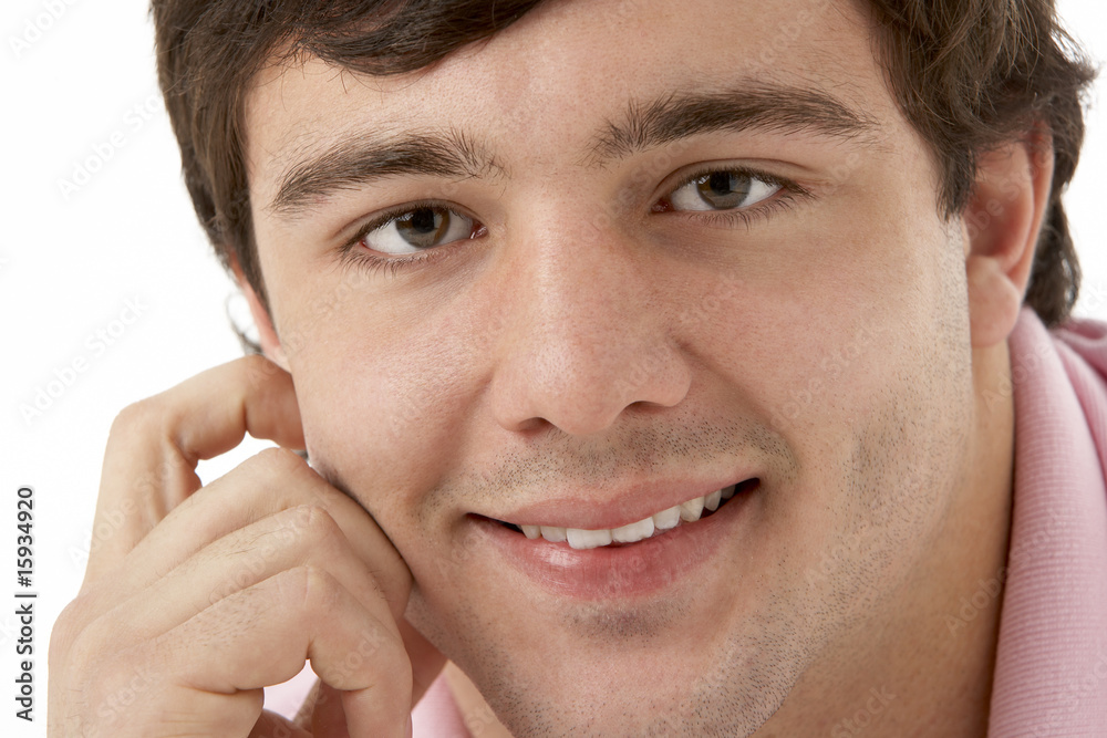 Obraz premium Studio Portrait Of Smiling Teenage Boy
