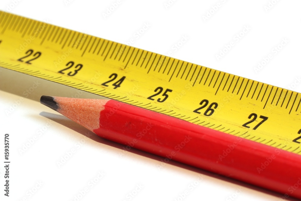Measuring tape and red marking pencil Measuring tape and red marking pencil