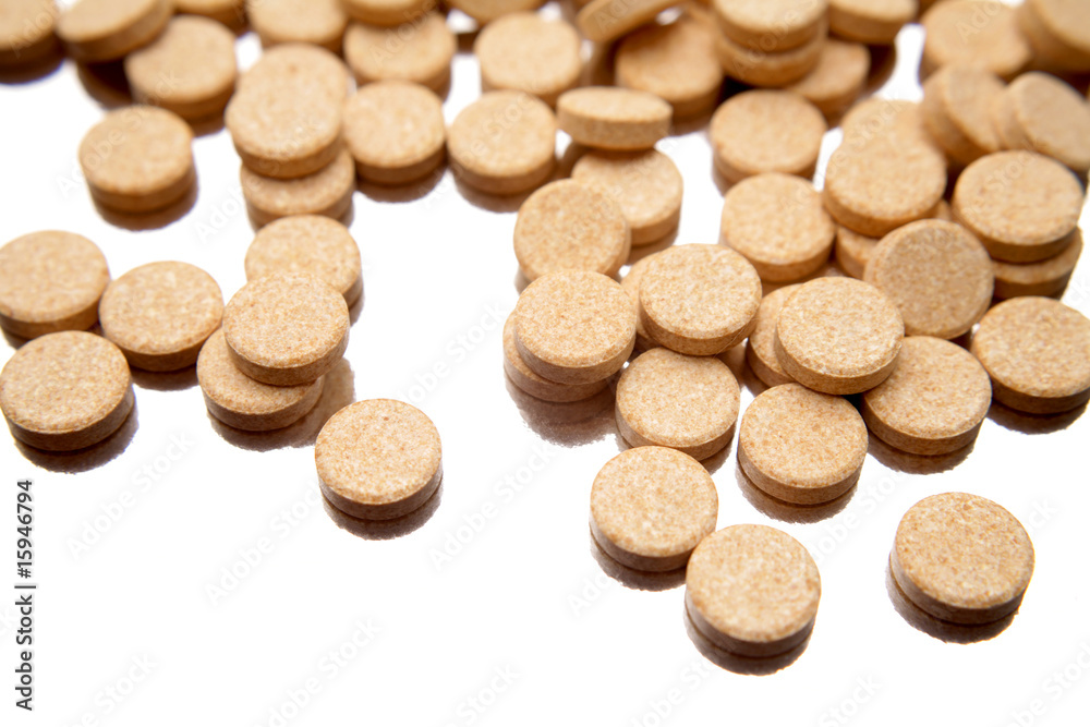 Vitamin C tablets on white background Vitamin C tablets on white background