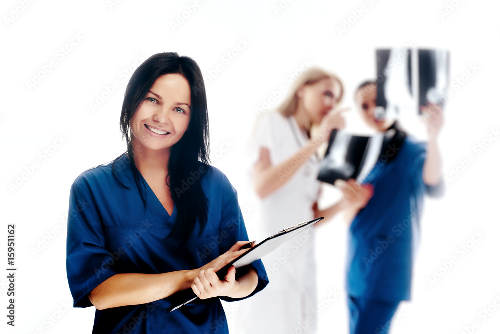 Smiling medical people. Doctors and nurses over white background Smiling medical people. Doctors and nurses over white background