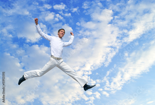 Wallpaper Mural men jumping against blue sky Torontodigital.ca